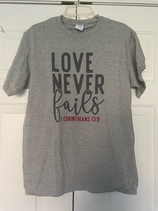 Port and Company Tops - 🪅15 for $20🪅 “Love Never Fails" Short Sleeve Tee NWOT- size medium
